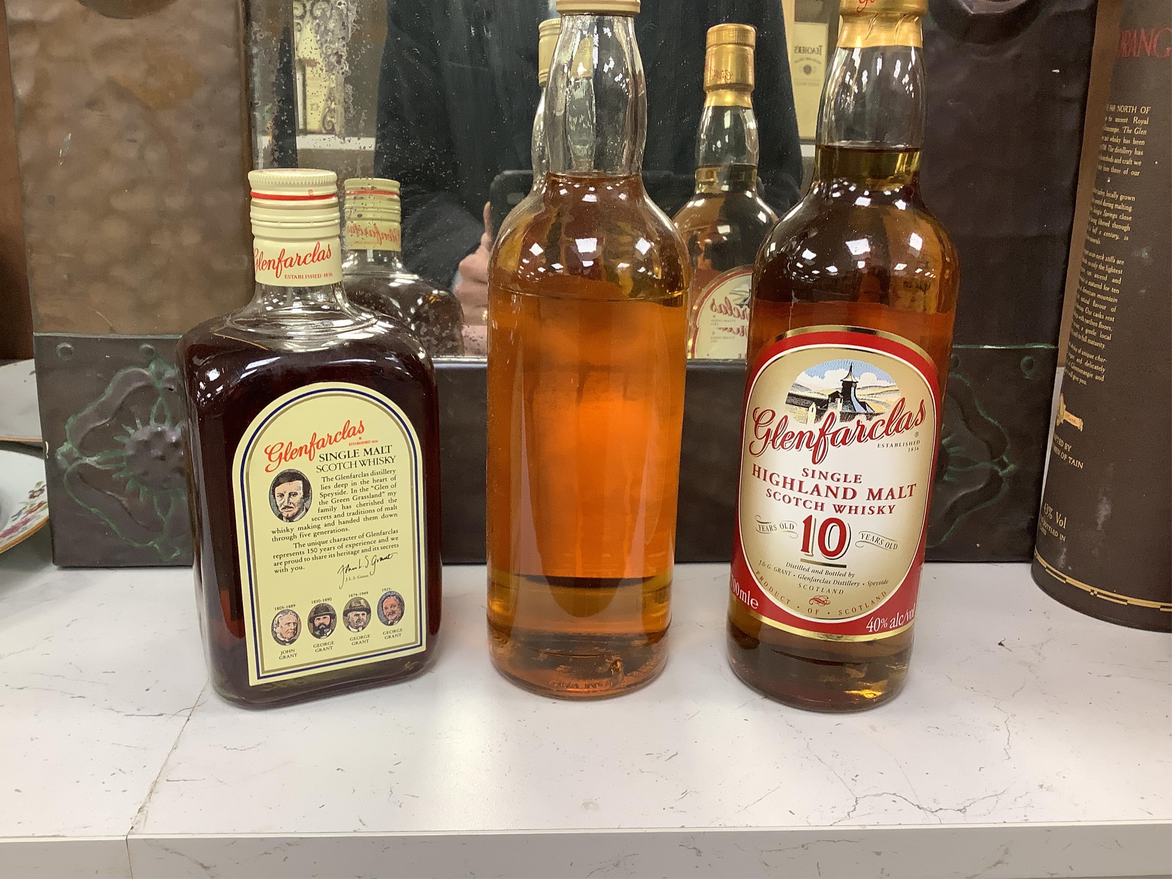 A group of ten bottles of Scotch Whisky; Glenfiddich Pure Malt Special Reserve 1 litre x2, Glenmorangie ten year 1litre, Glenlivet 12 year 70cl, Macdonalds Glencoe 8 year 70cl, The Famouse Grouse 10 year 70cl, John Hopki